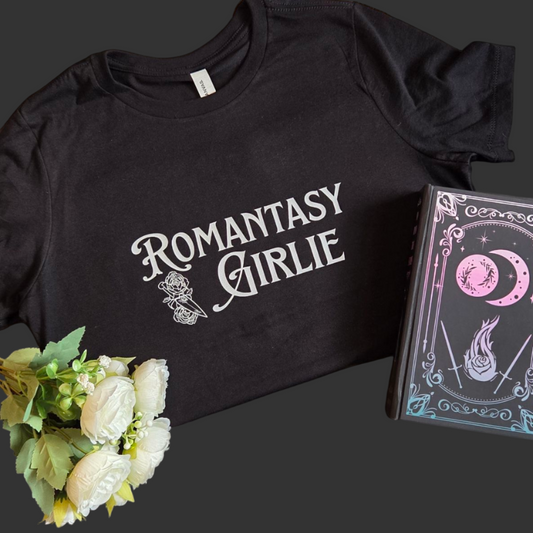 Black t-shirt with 'ROMANTASY GIRLIE' text on a black background