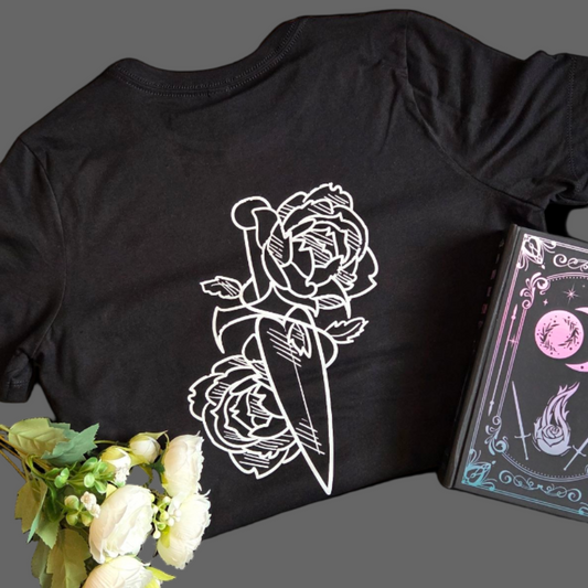 Black shirt with white rose covered dagger design on a black background